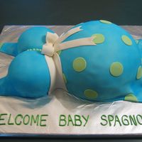 Blue Baby Belly Cake This cake was made for a baby shower. All they wanted was a pregnant belly cake and this is what i came up with. The cake was a 10"...