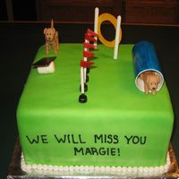 Dog Agility Coarse Cake I made this cake for a lady that loves to take her dogs to agility coarses to compete. All the decorations are made out of gum paste....