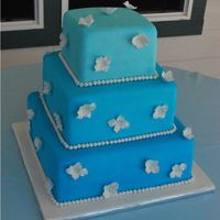 Blue Hydreanga Wedding Cake This is a 6", 9" & 12" square cake. I airbrushed the cake different shades of blue and added gumpaste white hydreangas....