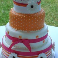 Tangerine This cake is originally from a clipping given to me years ago. The colors and flowers were changed for this bride. It was originally to be...