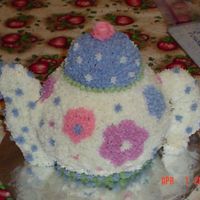 3-D Teapot This cake was for a Princess Tea Party theme 5th birthday. I used a ball pan for the main teapot; a mini half ball for the lid and sugar...