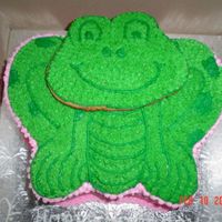 Frog (Wilton Pan) !st birthday cake for a little girl whose favourite stuffie is a frog. I made it two layers. Had a terrible time trying to get the two...