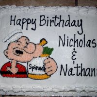 Popeye Cake This is just a regular 1/4th sheet cake iced in BC. I enlarged a popeye picture I had found in a coloring book and traced it on the cake....