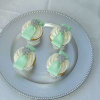 Sweet 16 Cupcakes These cupcakes were made for a Sweet 16. They were designed to match the birthday girl's gown that had a green sash and rhinestone...