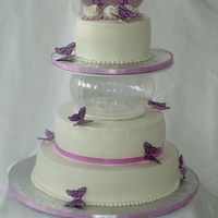 Lavender Engagement All buttercream with real ribbon and handmade chocolate butterflies.