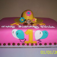 A Curious George copied this cake from cakesbybert. it was just what i was looking for.... did add a few changes to mine. all fondat covered