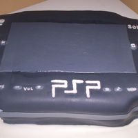Psp cake made for my nephew. 1/2 chocolate and 1/2 white.