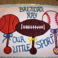 Rattles shower cake for sports family, all buttercream