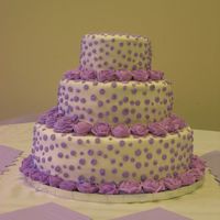 Purple Polka-Dots The roses are royal icing. Everything else is buttercream.