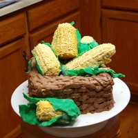 Corn Basket weave, corn cake. I made the corn using the inside of the 3-d bear pan. gave me a great shape that I didnt have to carve. husks are...