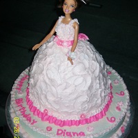 Pink / Hot Pink / White Barbie Doll Birthday Cake Barbie Doll 6th Birthday Cake. Chocolate 14" round base cake with white buttercream icing. Wilton doll cake pan and 2 10" white...