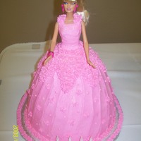Pink Barbie 4Th Birthday Cake Used a real Barbie doll wrapped in Saran Wrap from Waist down...(actual birthday present)...Pink Dress - used two 8" round cakes (...