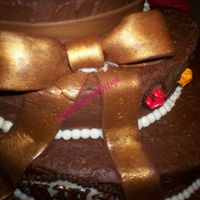 Close-Up Of Bow Made out of Fondant, this bow is accented in lusterdust.