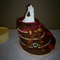 Chocolate Dream Yellow CakeIced with Dark Chocolate Butter Cream4 Tiers