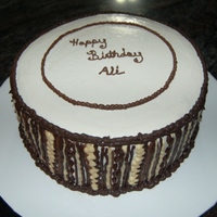 Chocolate Piping Marble cake w/ vanilla bc. This was for a guy & I was given no direction. Piped various lines, squiggles etc with white, milk &...