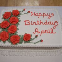 Red Rose this was for a guy at works daughter. chocolate cake with white icing and red roses. just what the customer ordered.