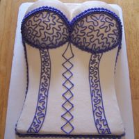 Purple Corset this cake was done for a lady that was having a lingerie party and this is what i came up with. yellow cake 11x15 and then the sports ball...