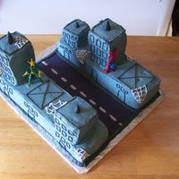 Spidey City the same lady for the castle cake wanted this one also. they are twins one boy and one girl. couldnt get the icing really smooth but i...