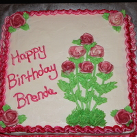 Rose Cake made this for my sister in law. the roses are the pre made wilton white roses and I just brushed some pink luster dust on them.