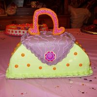 Rachel_6_050.jpg carved from stacked cakes-buttercream covered handle made from styrofoam plate and inserted w/ toothpicks