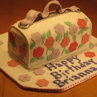 Flower Purse This was done to look like the birthday girls favorite purse. I was happy with how it came out. Choco cake with fondant. Thanks for looking...
