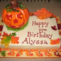 Pumpkin Birthday This was so much fun. I used the new wilton pan for the pumpkin. 11x15 sheet cake. All buttercream and fondant. The leaves were my favorite...