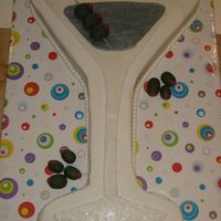 Martini Cake Thanks to Meghanb for the inspiration for this cake! It's a BIG glass carved out of two 11x18 pans. Fondant accents with fondant...