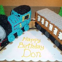 Train I borrowed ideas from a number of cakes in the gallery for this one. Thanks to everyone for posting your Thomas cakes.