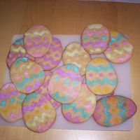 100_0648.jpg Done with a large egg cookie cutter that came with a stencil.