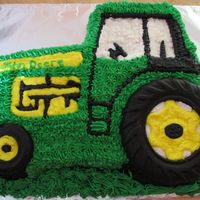 John Deere Cake I made this cake for a 6 year olds birthday party.The tires are made out of chocolate.