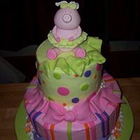 Piggy Ballerina 11" and 6" rounds covered in BC with Fondant accents. The piggy and bows are a gumpaste/fondant mix.