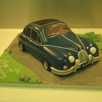 Mk2 Xk8 Jaguar Sugarpasted chocolate cake. For a Jaguar enthusiast. Took absolutely ages, I take far too long with car cakes.