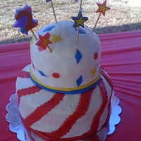 Circus Themed Birthday For a brother and sister (2 & 3 years old) birthday party with a circus theme. The decorations (stripes, stars, shapes) are fondant.