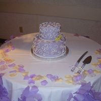 Lilac And Yellow Calla Cake This was a little two tier that went with the cupcakes for the same wedding. The callas are gumpaste and very non-professional, but you get...