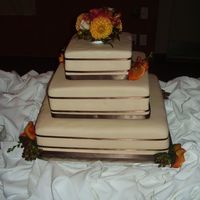 Modern Ribbon Cake I really liked the final look of this cake. It was actually a deep cream, not as dark as it appears here.It was a really good, non-theme-y...