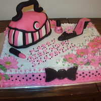 Birthday Cake I made this cake for my daughter's 31st birthday. I made the purse out of rice krispy treats. The other decorations were made from...