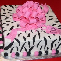 Zebra Striped Birthday Cake iced in buttercream, stripes are fondant, bow is fondant/gumpaste