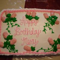 Birthday Cake buttercream icing with candywafer roses
