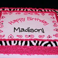 Zebra Shag used grass tip to make hot pink "shag" and then filled in with zebra border. all buttercream - very simple :)