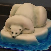 Polar Bear Christmas Cake Just a polar bear laying on an iceberg. All stain ice fondant and airbrushed;-)Merry Christmas friends!!!