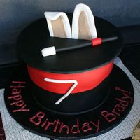 Brady's Magic Hat Cake Made for a Magician b-day party, fondX airbrushed black, all fondant accents.