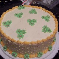 First Cake - A St. Patty's Day Theme I Guess First cake from class... wasn't planning on doing green flowers but heck - St. Patty's day is coming up, right?! Ha!