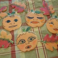 Pumkin Grandkids These are sugar cookies made with pumpkin cut out and then frosted with a thin coat of a powdersugar milk frosting. After the frosting gets...