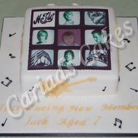 Mcfly Birthday Cake The picture i the middle is an edible image with a photo of the birthday boy added.