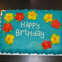 Tropical Birthday Cake 1/2 sheet butter cake w/buttercream and marshmallow flowers to resemble hibiscus