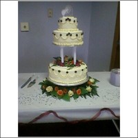 Third Wedding Cake This is my third wedding cake made for one of my husband's co-workers. She and the groom were happy with the results.