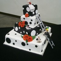 Julie Vanilla cake with strawberry preserves filling iced with all butter buttercream and fondant icings. Each layer of each tier was rotated...