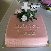 Baptism Vanilla cake with strawberry preserves and all butter buttercream and fondant icings. Quilted sides, gum paste cross (texture done using...