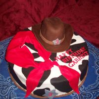 Cowboy Cake This was my first cowboy hat. This cake was alot of fun to make!! It's WASC with strawberry cream filling.