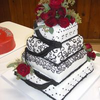 Lacey's Wedding This cake was a disaster, if was beautiful before we go to the reception hall. It was pouring down rain that day, and with everything I did...